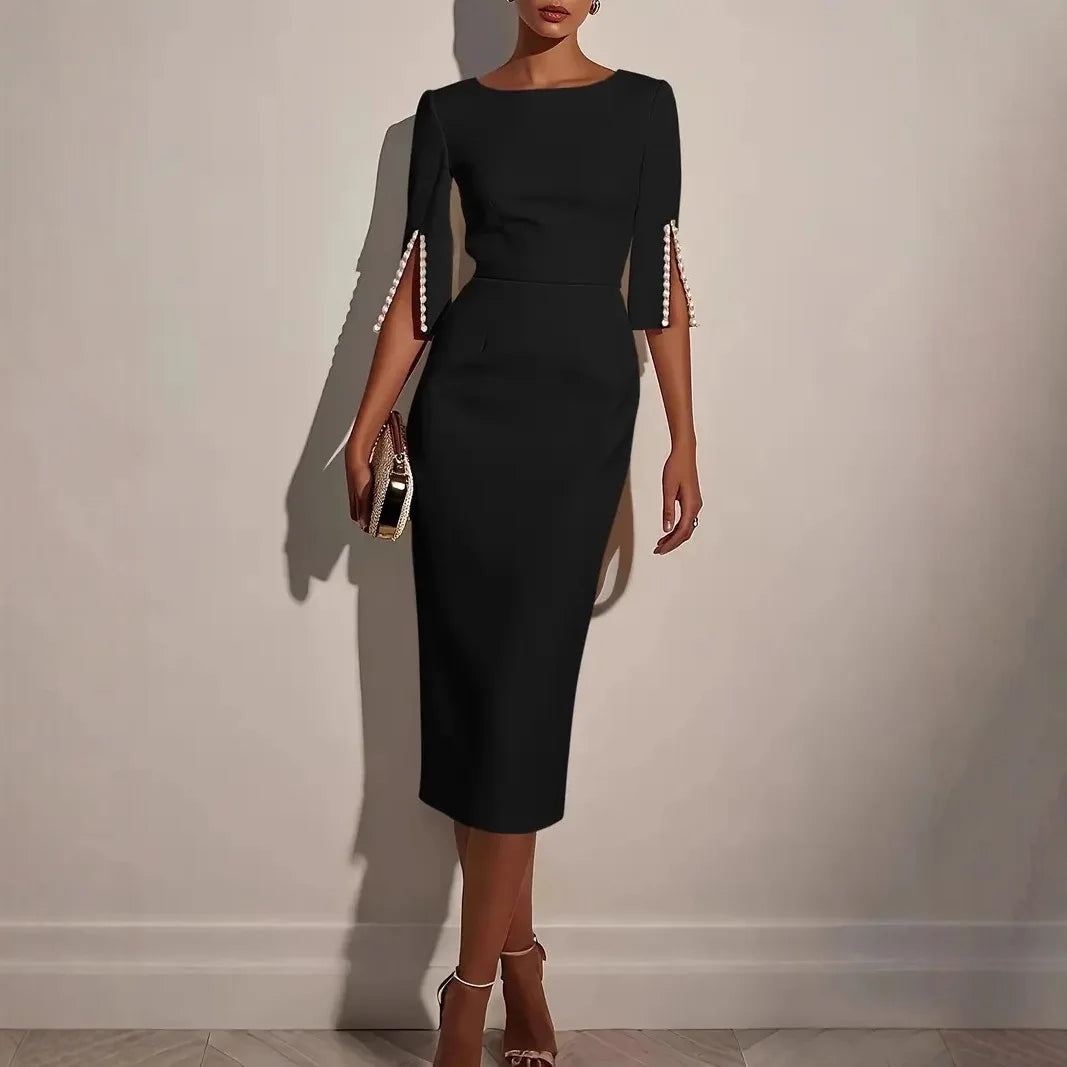 Agnès Paris | ROBE ÉLÉGANTE À MANCHES FENDUES ORNÉES DE PERLES