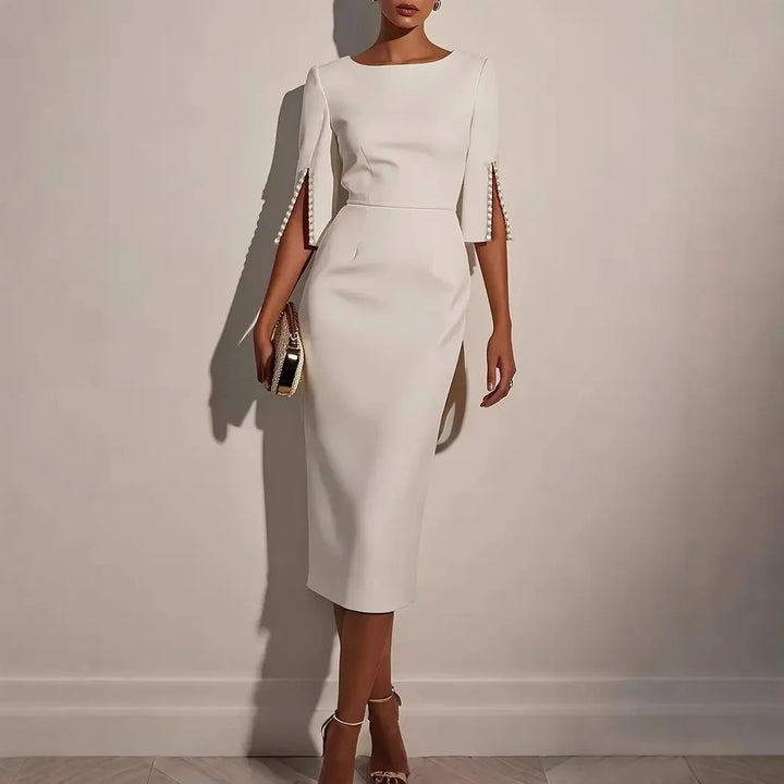 Agnès Paris | ROBE ÉLÉGANTE À MANCHES FENDUES ORNÉES DE PERLES